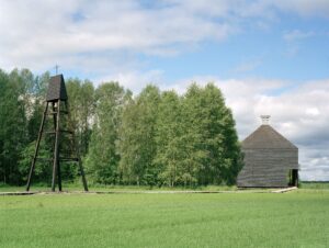 Kärsämäki Shingle Church and belfry seen in the green summer landscape