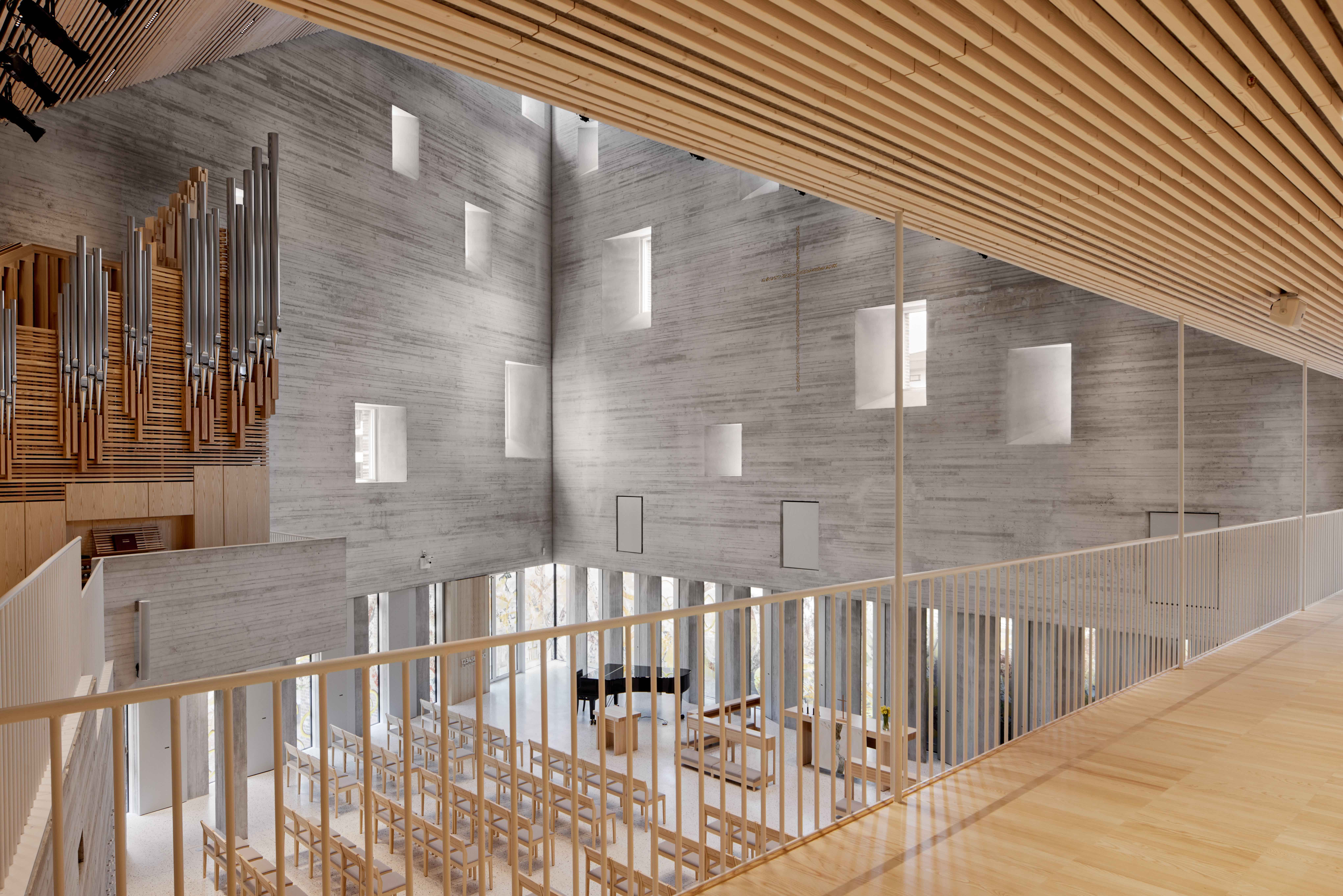 The Church Hall of the Tikkurila Church seen from the balcony, showing the organ across the balcony and the altar and the seating on the main floor