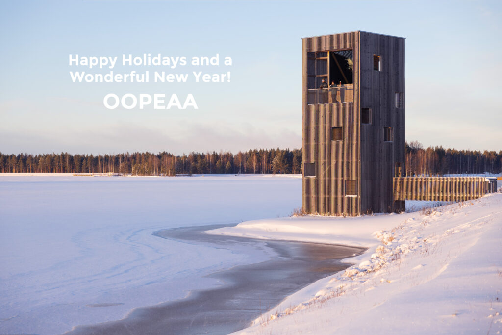 A wooden viewing tower, Periscope in winter landscape with three people on the upper landing looking out over the frozen lake