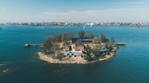 Lonna Island with a sauna in the forefront and the city in the background