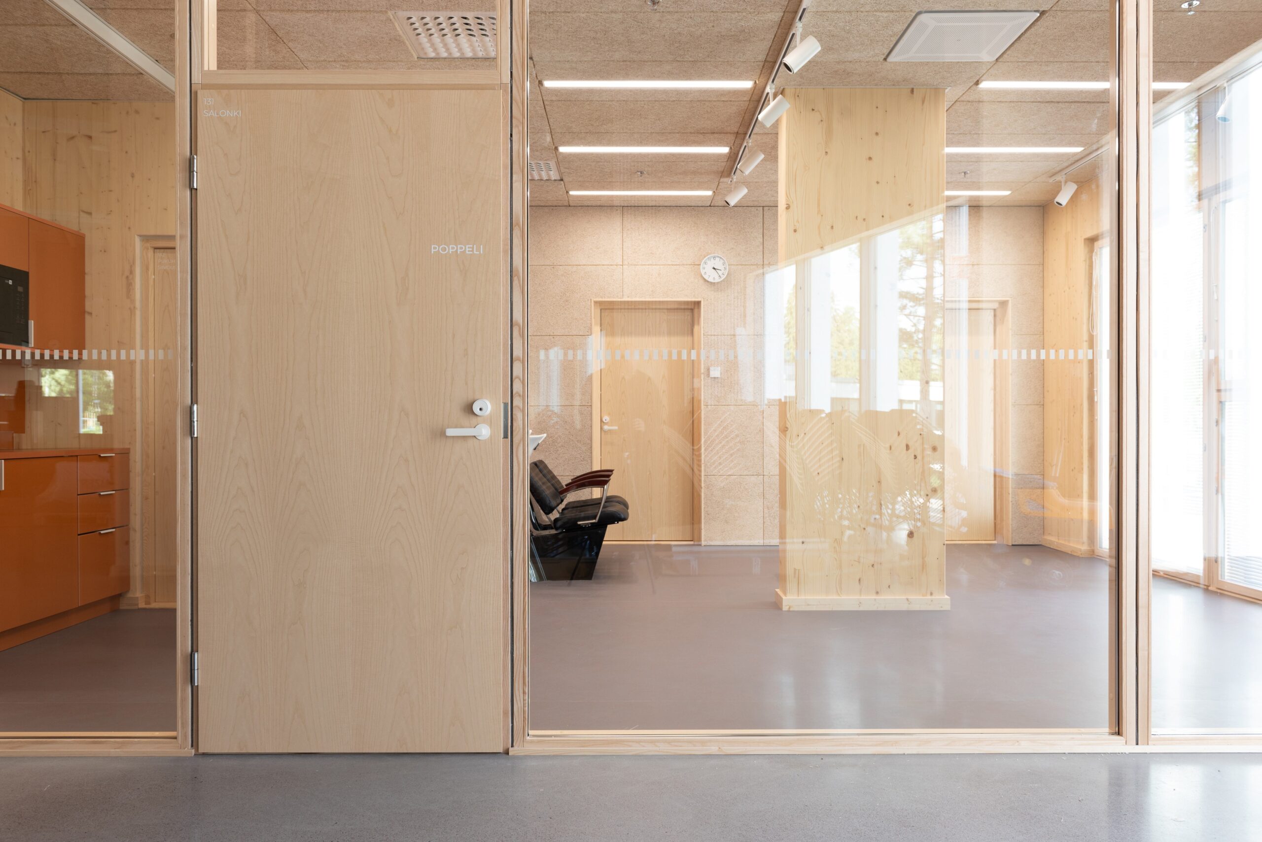 A photo showing how the beautician & hairdresser spaces open to the lobby