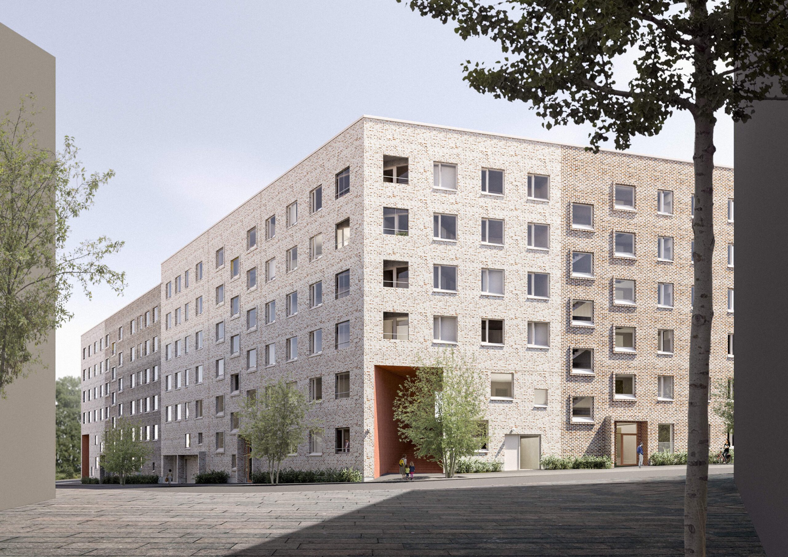 View showing the corner of an apartment building with a light-colored facace of brick