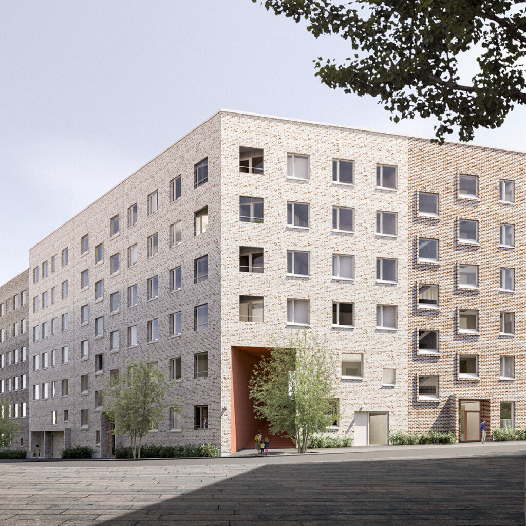 A view showing the corner of an apartment block with a light-colored facade